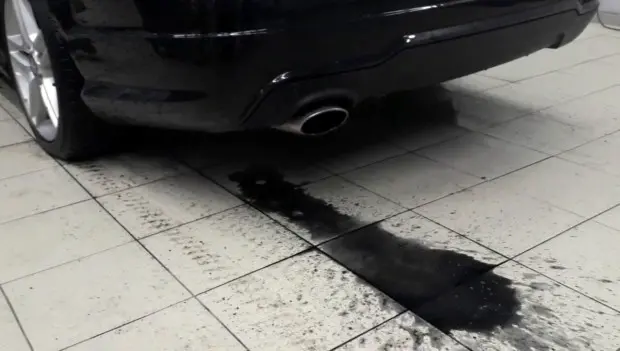 Why Black Liquid Sometimes Spits Out of the Exhaust — and When You Should Worry