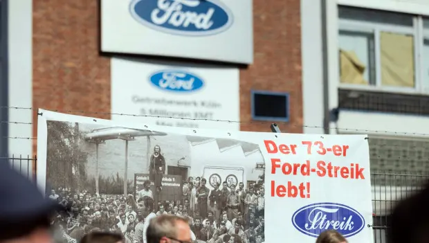Ford Workers Stage Mass Walkout After Plans to Cut 14% of Jobs