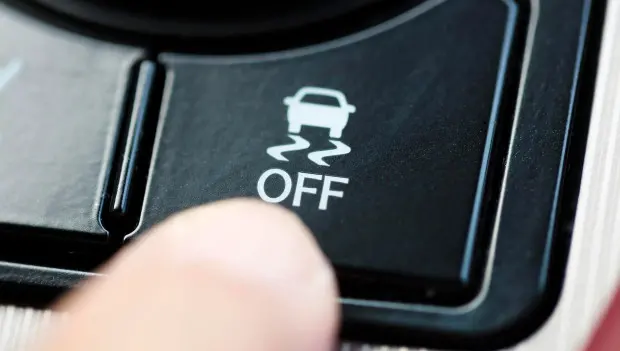 The Skid Button Many Drivers Don’t Understand: What Traction Control Is and How It Works
