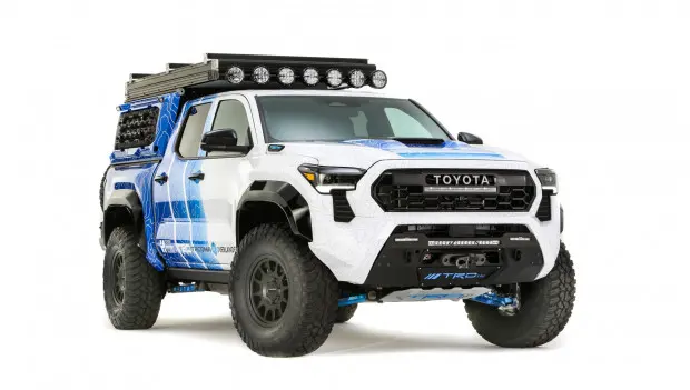 Light Toyota Tacoma camper truck makes its own water supply