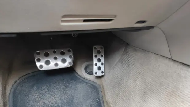We Know What the Button Behind Your Gas Pedal Does — And It's Even Found in Manual-Transmission Cars