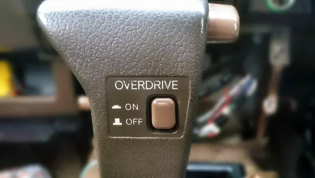 What the Mysterious “Overdrive” Button Was For — and Why It Disappeared From Cars