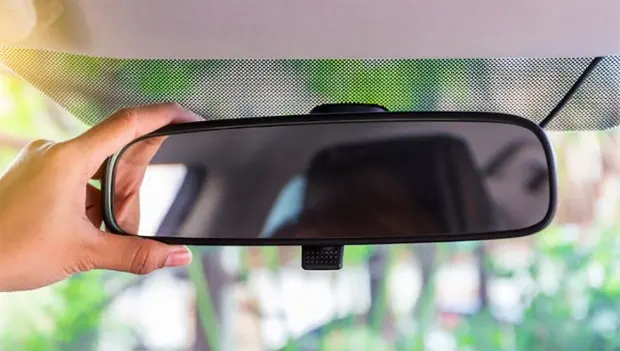 Your Car’s Rearview Mirror Might Have a Hidden Button You’ve Never Used