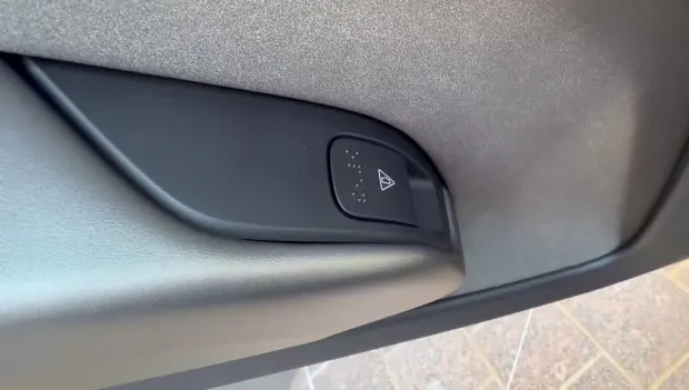 Tesla Cybercab Debuts 2-in-1 Door Handle With Braille for Easier Emergency Opening