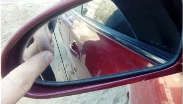 That Vertical Line on Your Side Mirror: What It’s Actually For