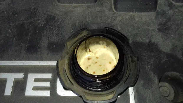 What That White Residue on Your Oil Filler Cap Means — and Whether You Should Worry