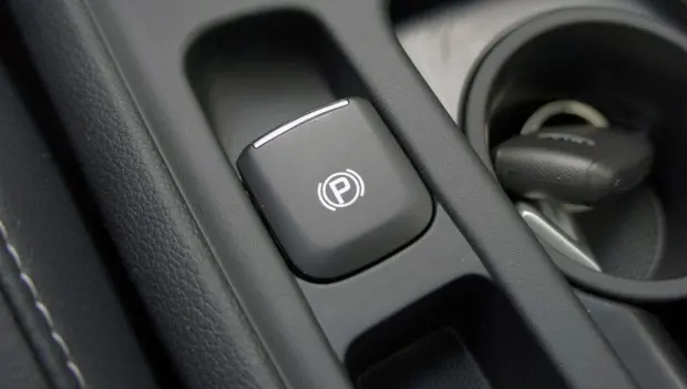 Hidden Functions of the (P) Parking Brake Button Many Drivers Don’t Know About