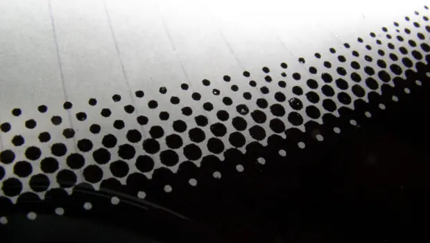 Mystery of the Black Dots on Your Windshield: Why Engineers Hide This Code in Plain Sight