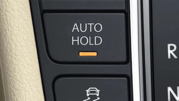 That Little Auto Hold Button Could Make Your Daily Commute a Lot Less Annoying