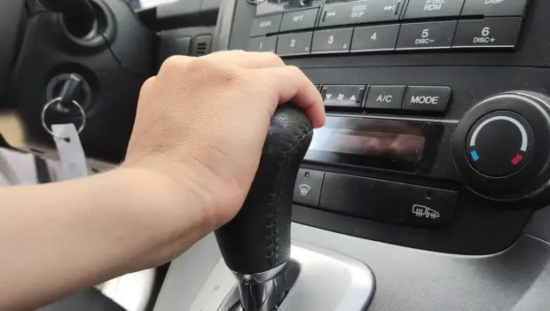 Parking on a Hill: How to Use the Parking Brake Properly to Protect Your Automatic Transmission