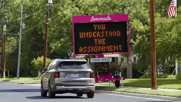 Drivers Are Seeing Strange Pink Signs on the Road—What They Say Is Surprising Everyone