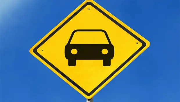 The Strange Truth About Driving Laws Around the World: Coffee, Kisses, and Other Surprising Bans