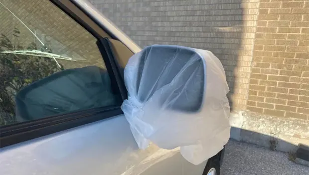 Why You Should Never Ignore a Plastic Bag on Your Car Mirror