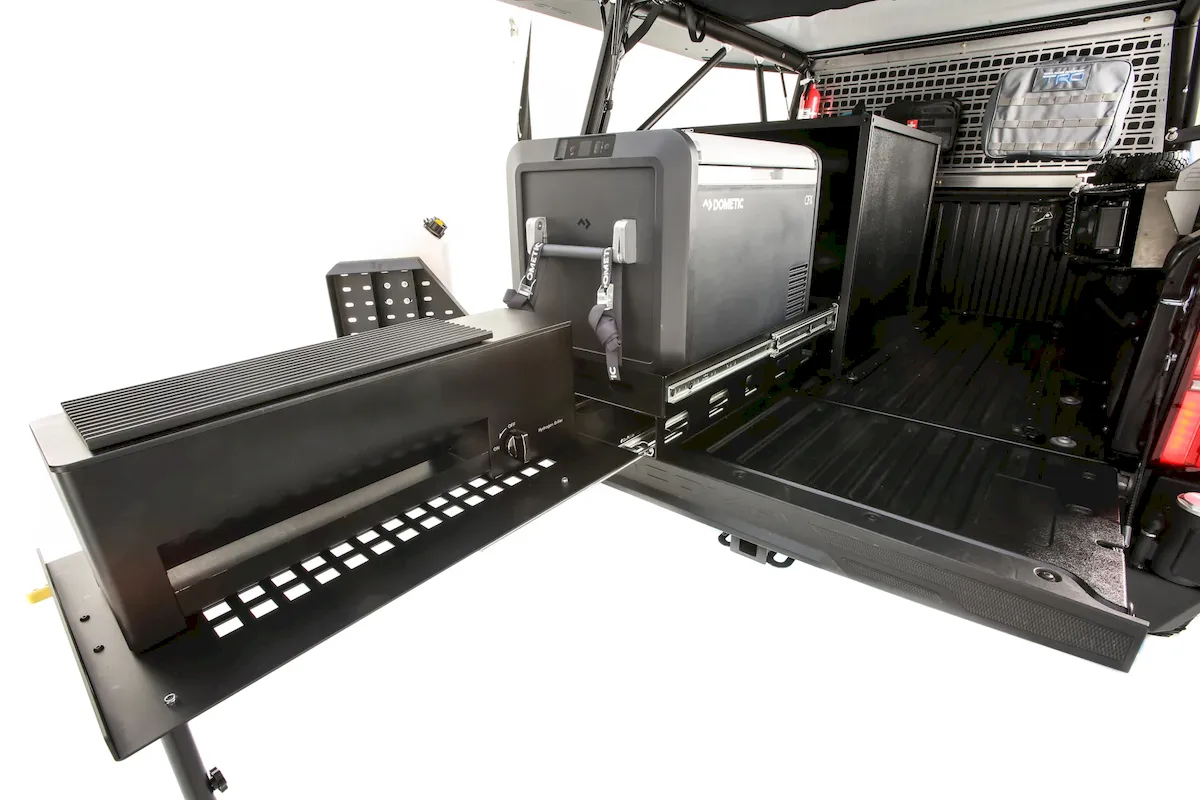 Onboard hydrogen and a battery pack provide power for camp accessories