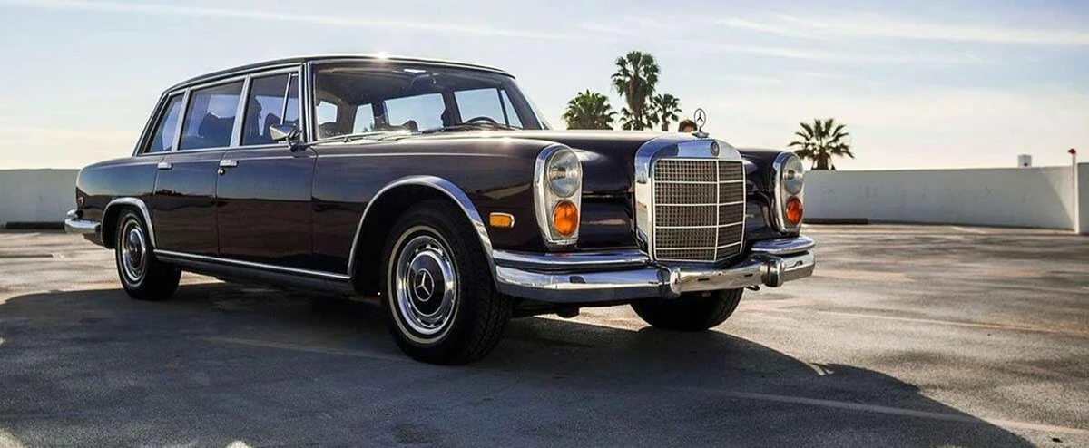 The Iraqi leader preferred the Mercedes‑Benz 600 Landaulet.