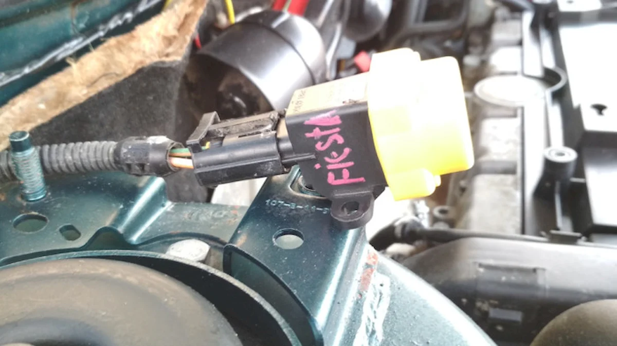 Button in the engine bay