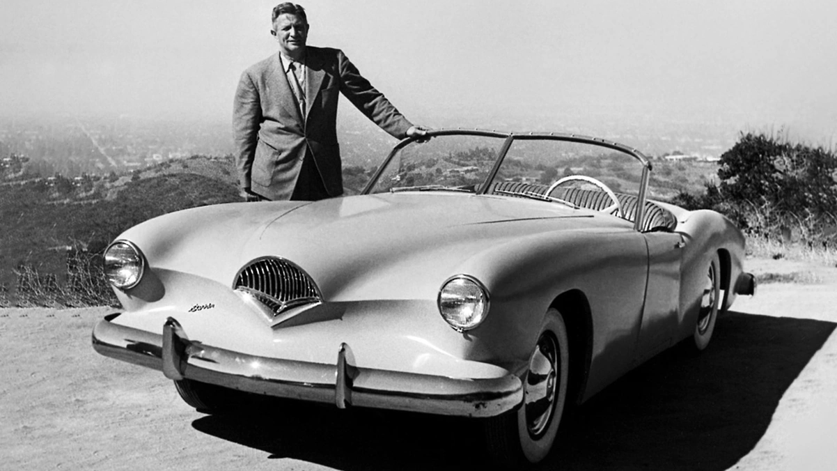 Howard Darrin next to his creation