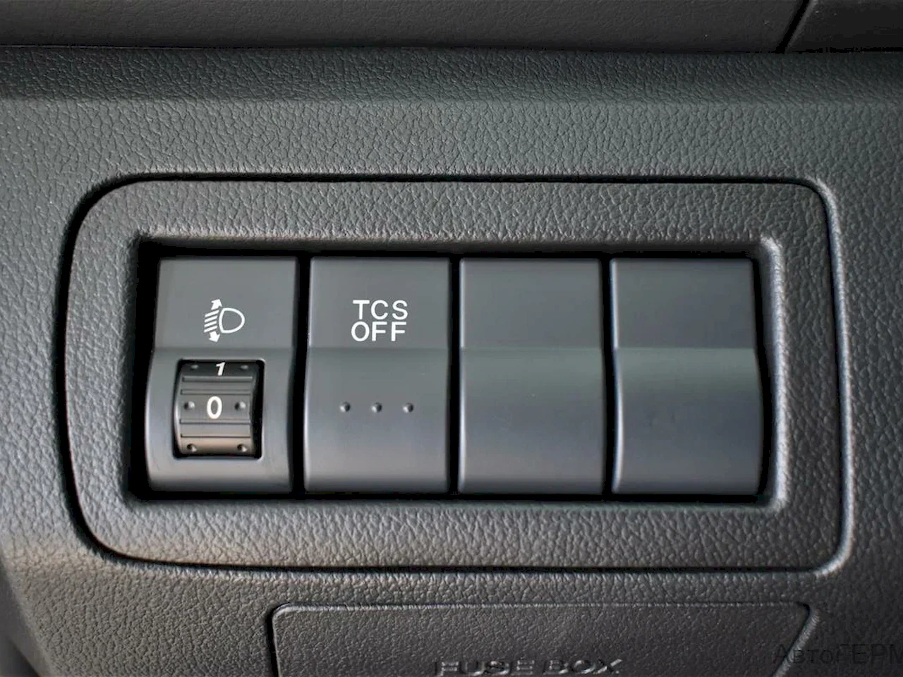 TCS OFF button