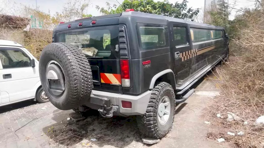 Hummer H2 left outside the shuttered hotel in Macau