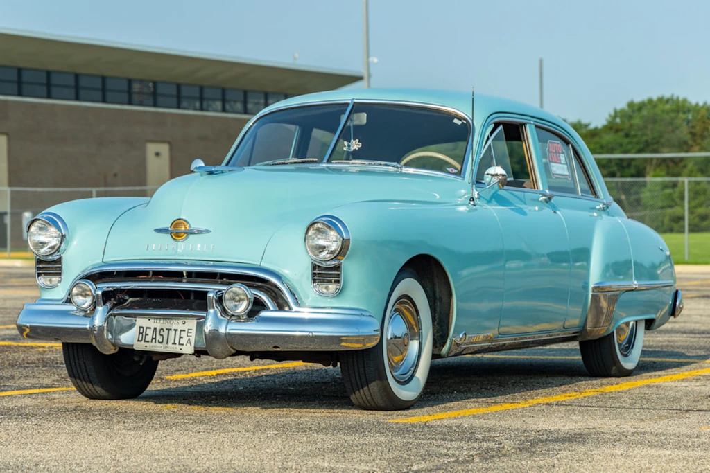 A large, heavy Oldsmobile 98 sedan